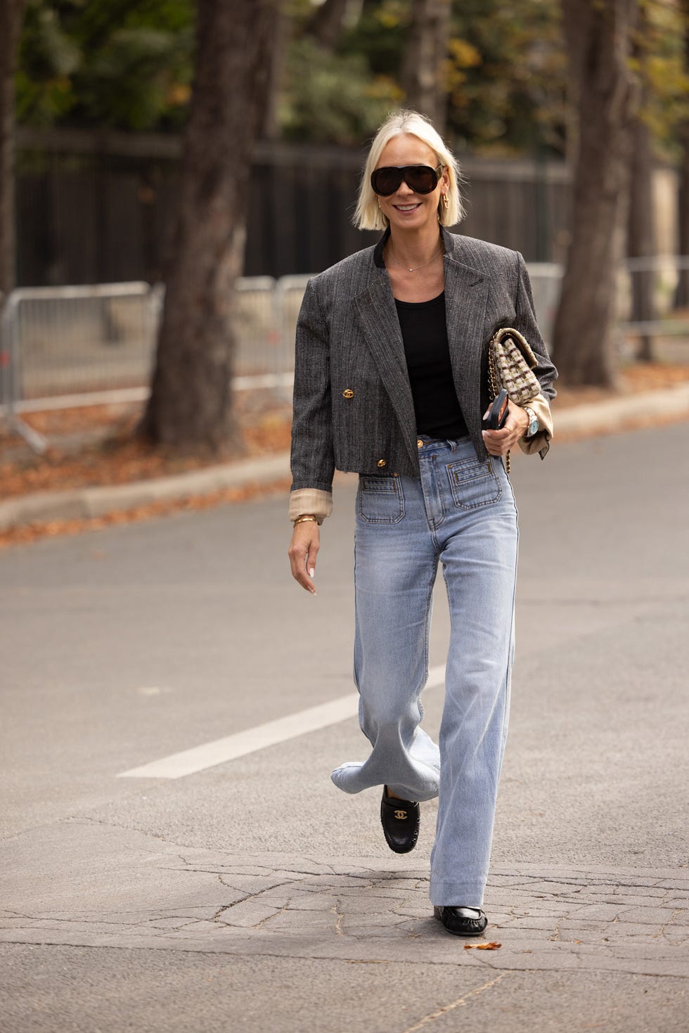 Chic Styling of Light Blue Wide Leg Jeans with Pinstripe Blazer — Trendy Blue Jeans Outfits