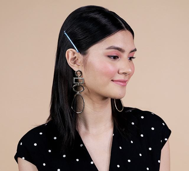 Sleek Black Chin Bob With Side-Swept Bangs And Pin — Trendy Bobby Pins Hairstyles