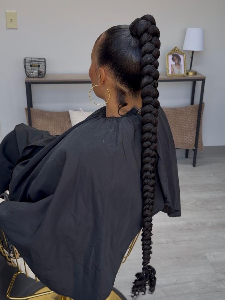 Voluminous Black Braided Ponytail Voluminous Black Braided Ponytail — Trendy Braided Ponytail