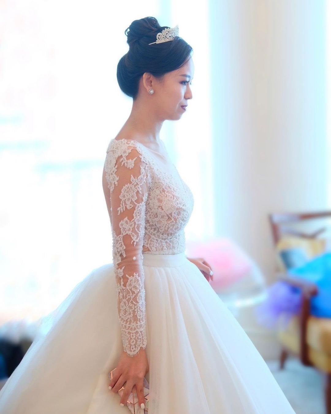 Low Textured Bun With Face-Framing Pieces Low Textured Bun With Face-Framing Pieces — Trendy Bridal Hair