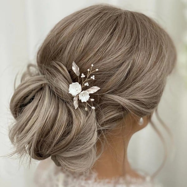 Loose Ash Blonde Updo With Floral Pin Loose Ash Blonde Updo With Floral Pin — Trendy Bridal Hair