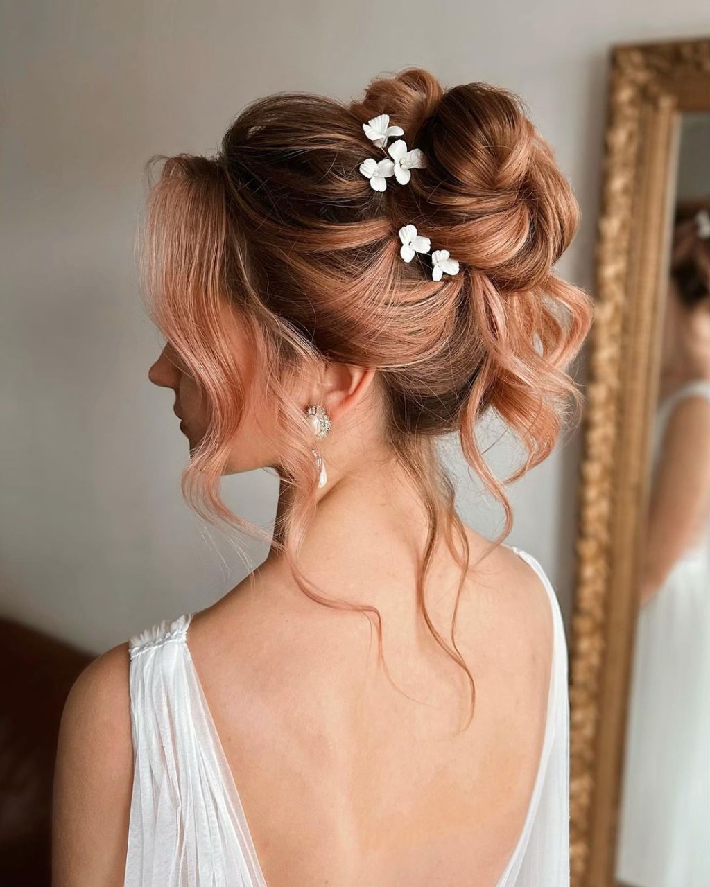 Rose Gold Updo With Butterfly Pins Rose Gold Updo With Butterfly Pins — Trendy Bridesmaid Hairstyles Updo