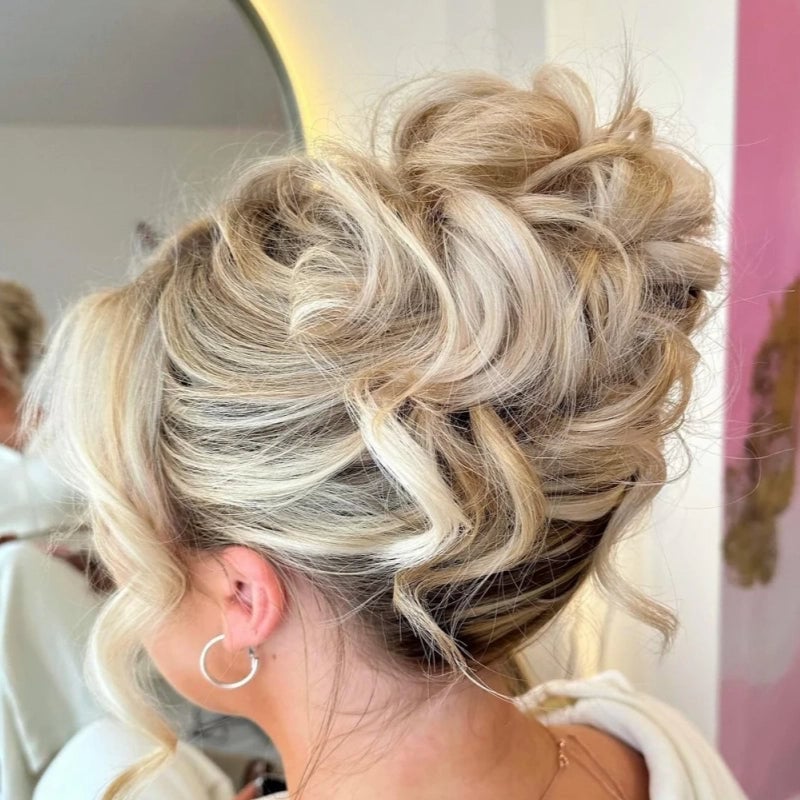 Sleek Low Twisted Bun Sleek Low Twisted Bun — Trendy Bridesmaid Hairstyles Updo