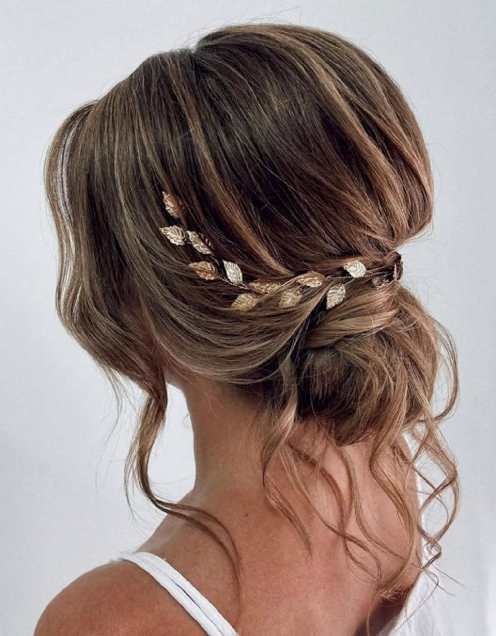 Textured Updo With Floral Accessory Textured Updo With Floral Accessory — Trendy Bridesmaid Hairstyles Updo