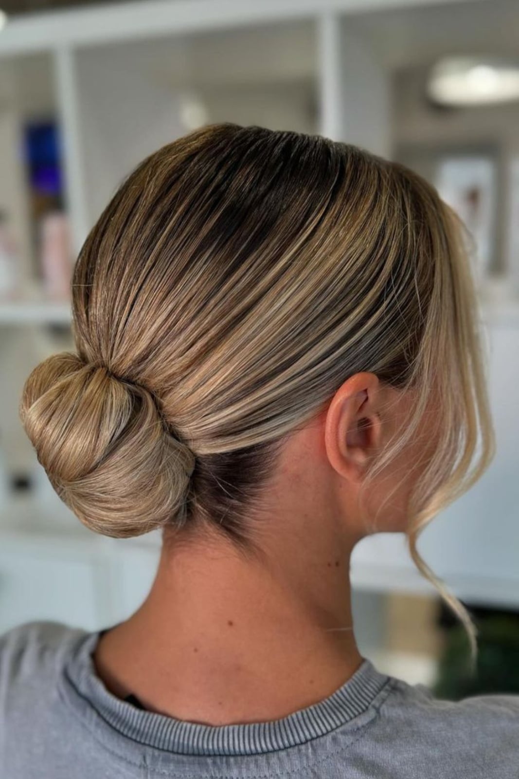 Sleek Low Bun With Dark Roots Sleek Low Bun With Dark Roots — Trendy Bridesmaid Hairstyles Updo