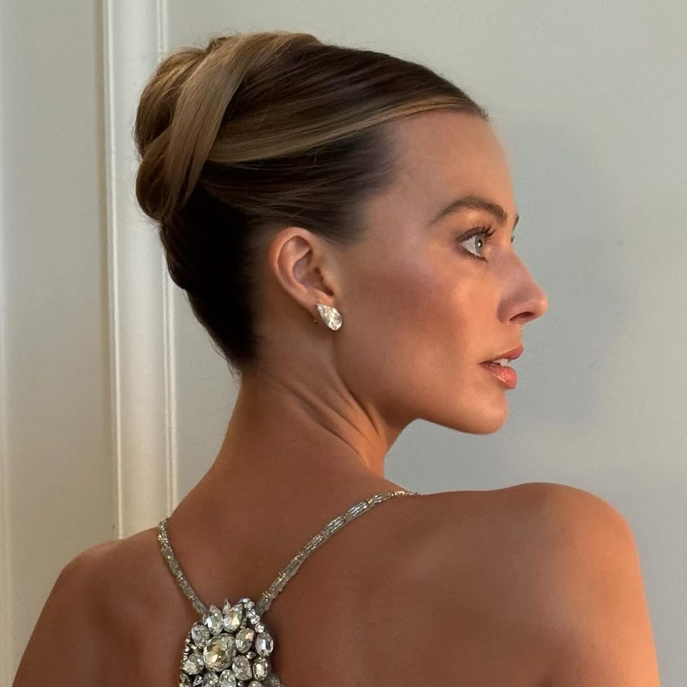 Sleek High Bun With Middle Part Sleek High Bun With Middle Part — Trendy Bridesmaid Hairstyles Updo