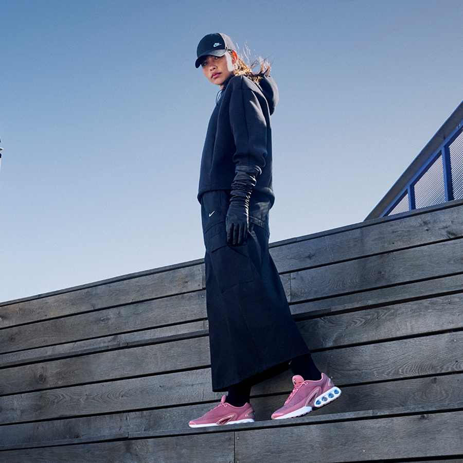 Black Hoodie With Leather Gloves And Pink Sneakers — Trendy Brown Hoodie Outfit
