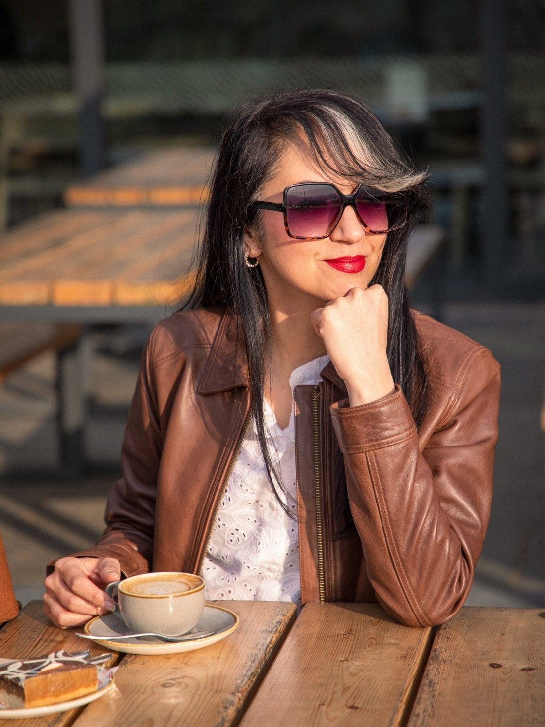 Fitted Brown Leather Jacket Texture Focus — Trendy Brown Jacket Outfit