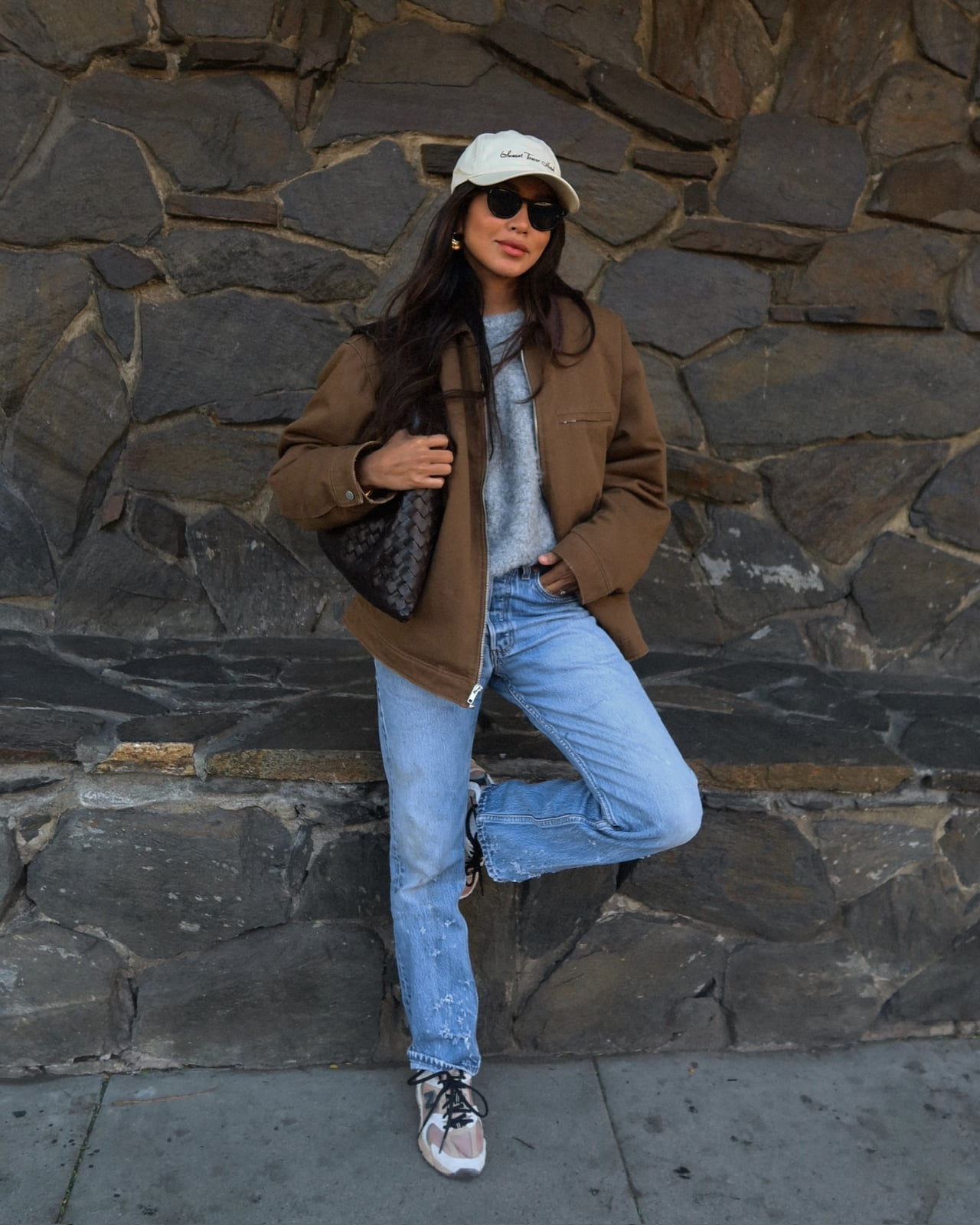 Utility Jacket With Distressed Denim and Grey Knit Sweater — Trendy Brown Jacket Outfit