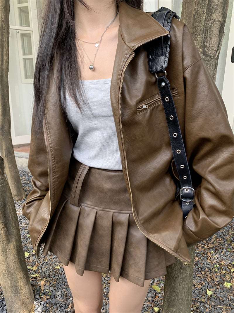 Brown Pleated Faux Leather Mini Skirt with Leather Jacket Brown Pleated Faux Leather Mini Skirt with Leather Jacket — Trendy Brown Leather Skirt Outfit