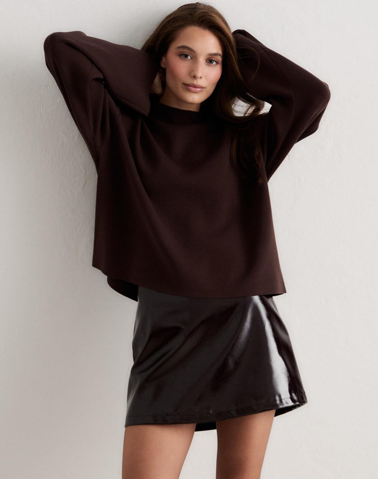 Glossy Dark Brown Faux Leather Mini Skirt with Matching Long-Sleeve Glossy Dark Brown Faux Leather Mini Skirt with Matching Long-Sleeve — Trendy Brown Leather Skirt Outfit