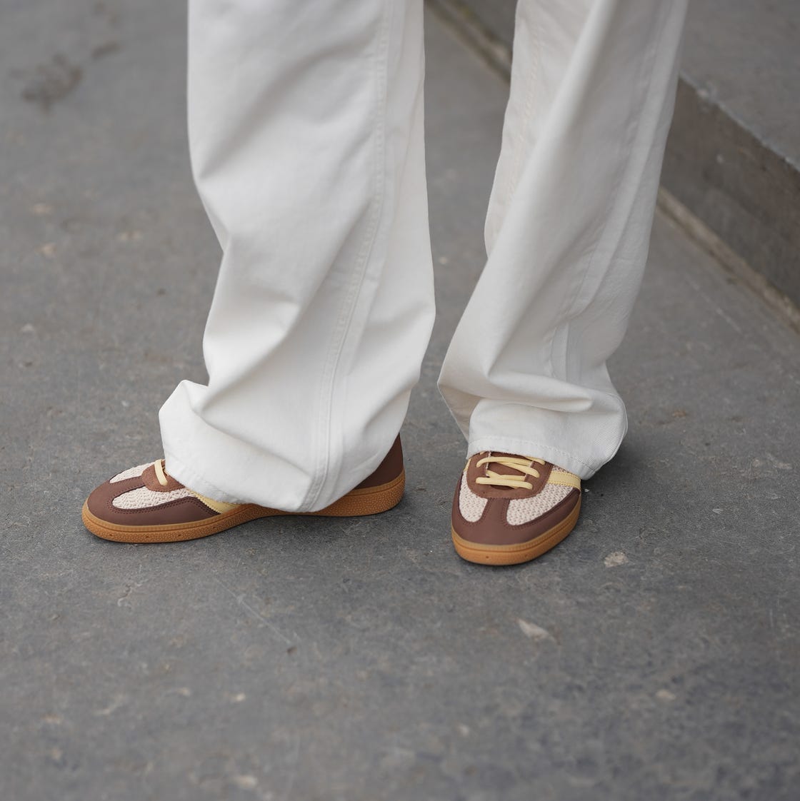 Brown and Cream Sneakers with White Trousers — Trendy Brown Sneakers Outfit