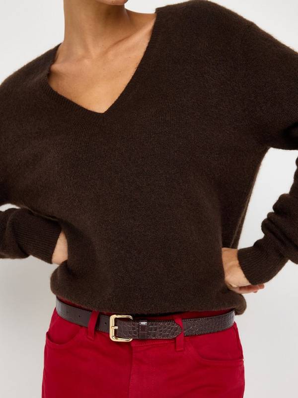 Relaxed Fit Brown Knit V-Neck Sweater with Red Trousers — Trendy Brown Sweater Outfit