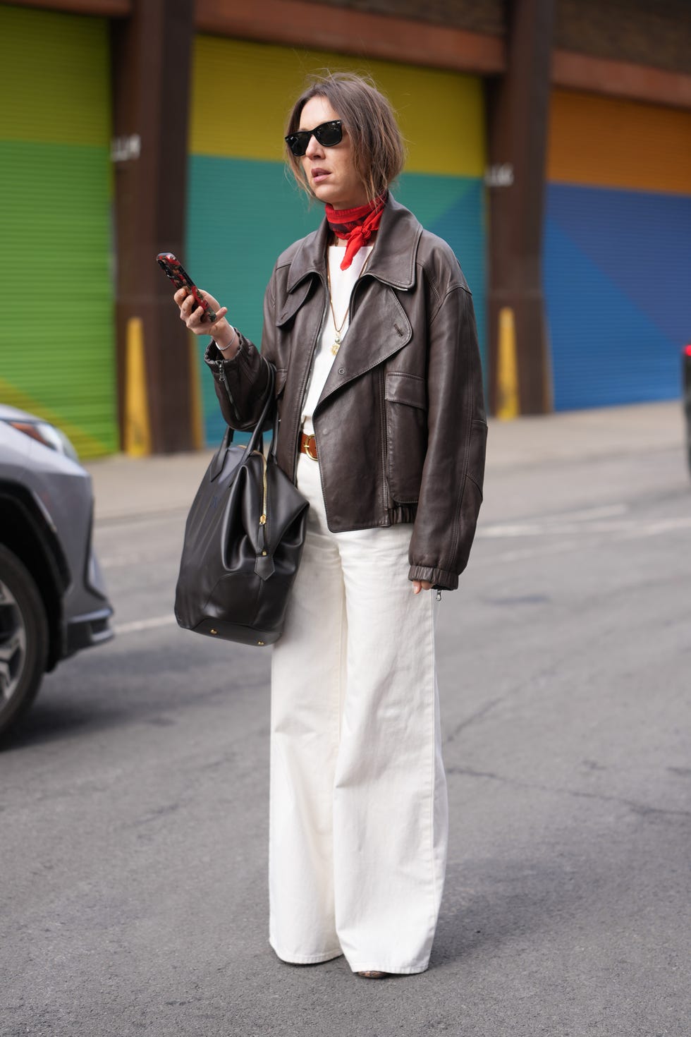Brown Leather Bomber Jacket with White Denim Trousers Brown Leather Bomber Jacket with White Denim Trousers — Trendy Business Professional Outfits