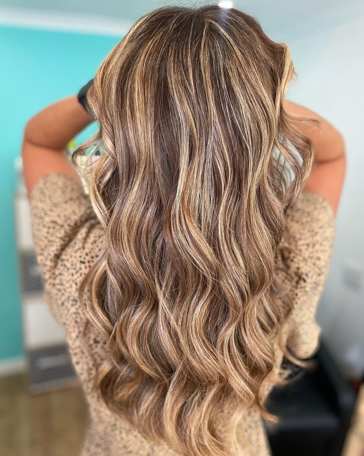 Mid-Back Layers With Caramel Highlights, Wavy Mid-Back Layers With Caramel Highlights, Wavy — Trendy Caramel Hair Color