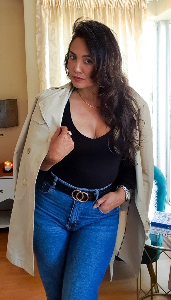 Blue Jeans With Black Top And Draped Trench Coat — Trendy Casual Dinner Outfit