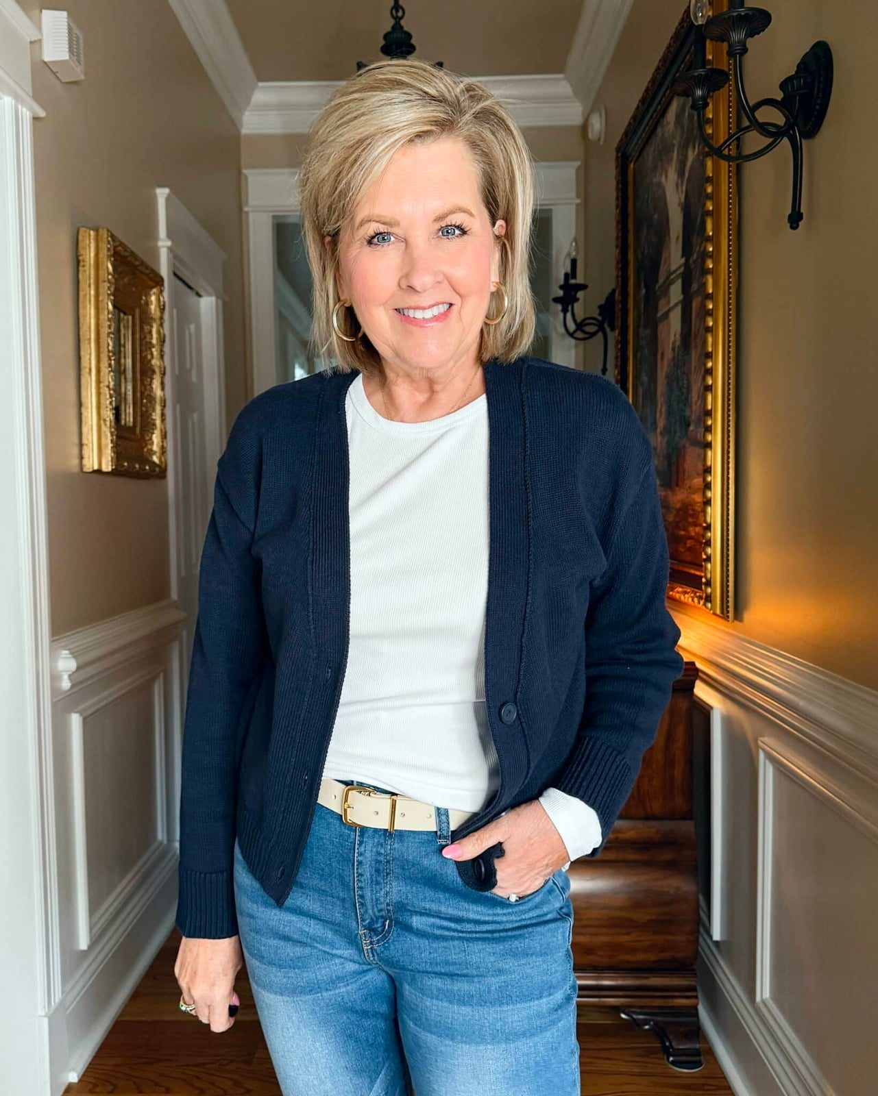 Navy Cardigan Over White Top With Blue Jeans — Trendy Casual Dinner Outfit