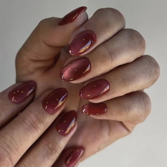 Deep Red Brown Cat Eye with Gold Studs Short Almond Nails — Trendy Cat Eye Nail Art
