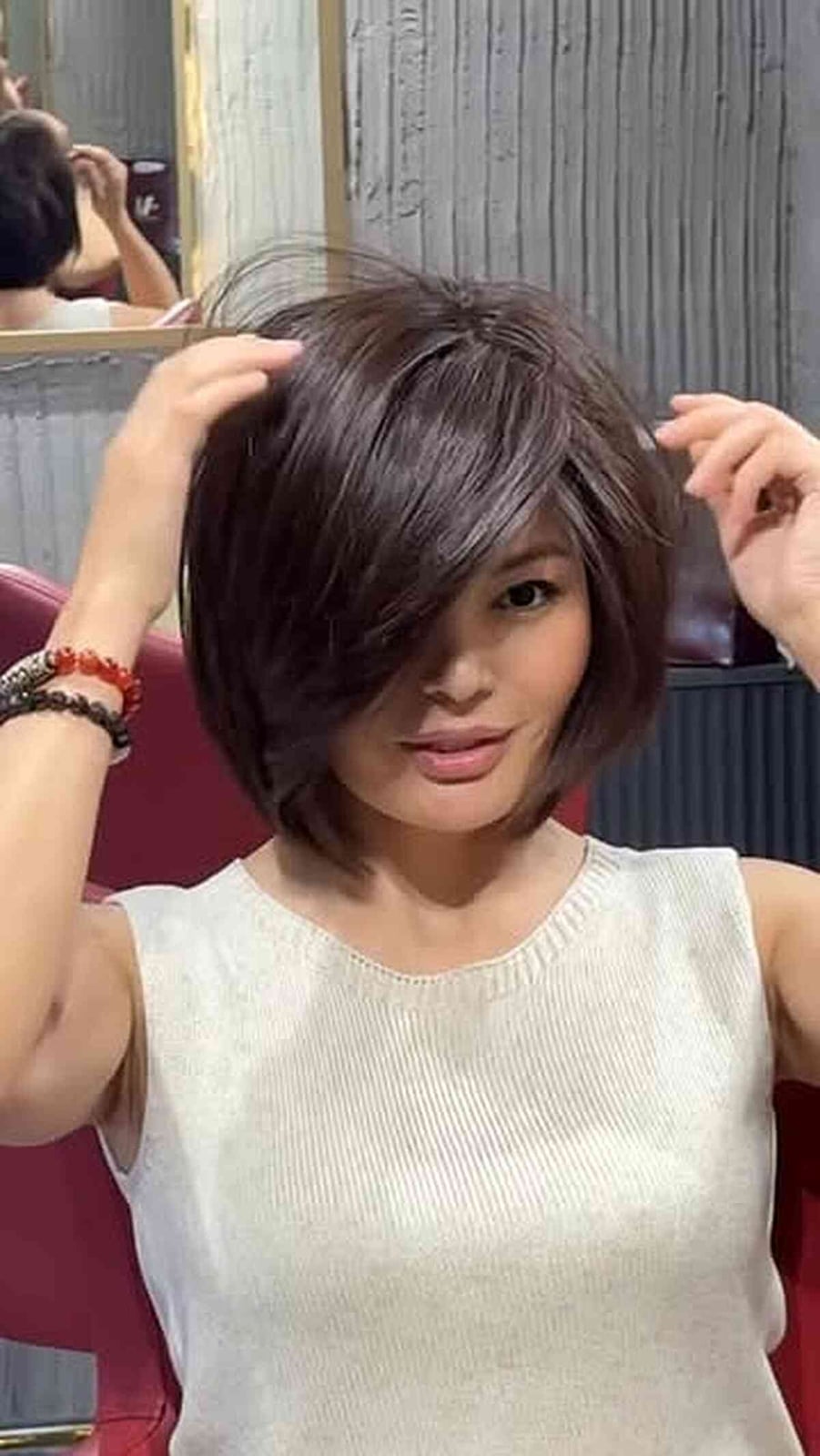 Dark Brown Bob Asymmetrical Layers Side-Swept Bangs Dark Brown Bob Asymmetrical Layers Side-Swept Bangs — Trendy Chin Length Hair