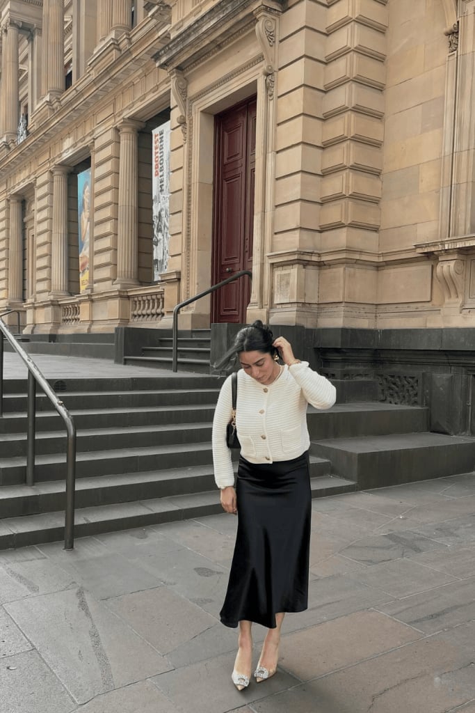 Cream Knit Cardigan Over Black Satin Midi Skirt — Trendy Church Outfits
