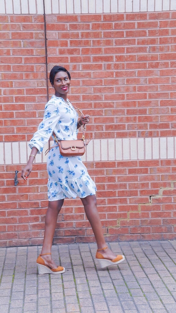 White Midi Dress with Blue Floral Print and Ruffled Hem — Trendy Church Outfits