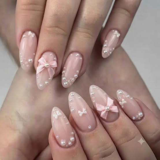 Long Stiletto Sheer Pink With Pearls and Bows — Trendy Coquette Nails