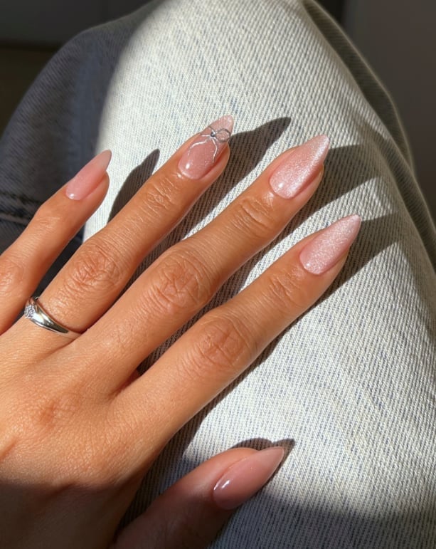Long Almond Nude Shimmer With Silver Bow — Trendy Coquette Nails