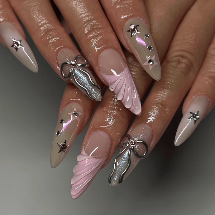 Long Stiletto Nude Pink With Silver Bow Charms and Stars — Trendy Coquette Nails