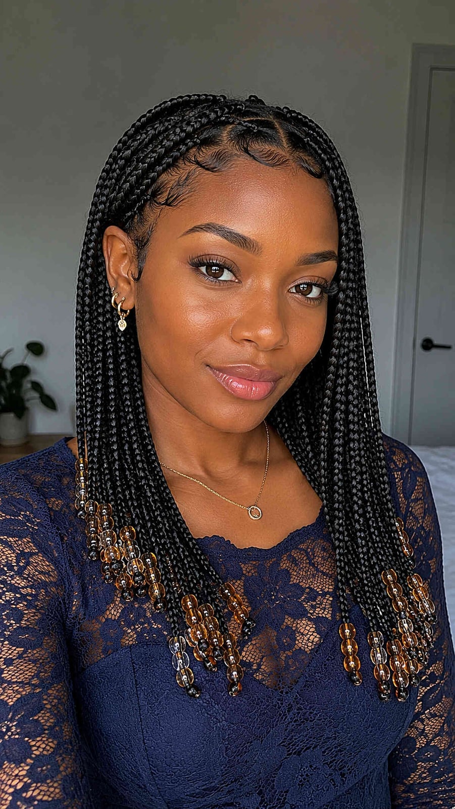 Mid-Back Wavy Box Braids With Beads Mid-Back Wavy Box Braids With Beads — Trendy Cornrows Hairstyles for Black Women