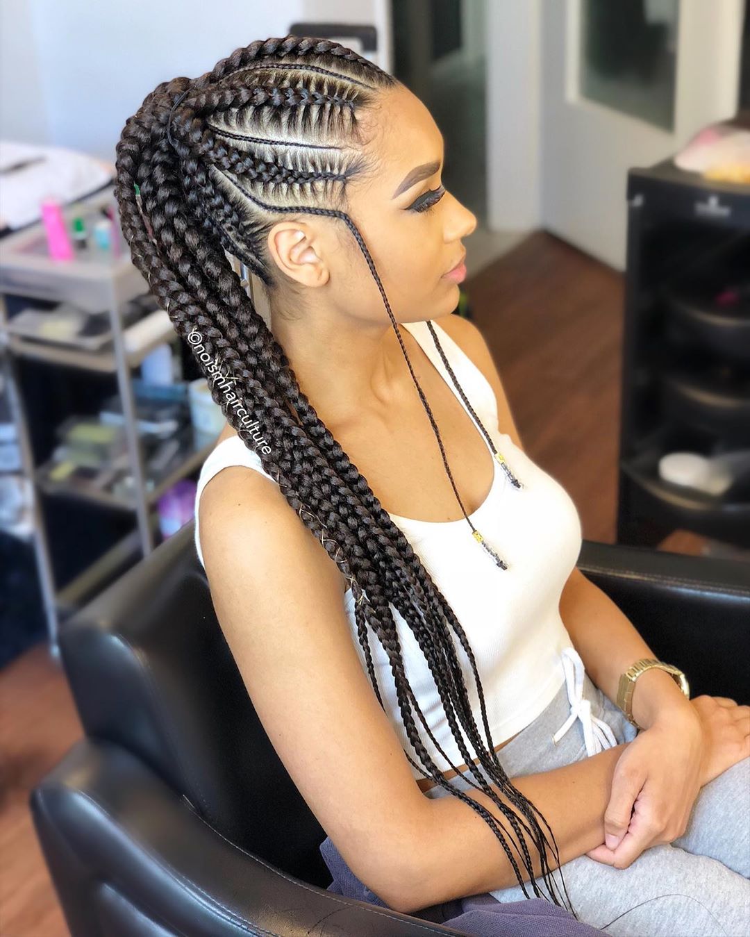 Mid-Back Cornrows With Geometric Pattern and Ponytail Mid-Back Cornrows With Geometric Pattern and Ponytail — Trendy Cornrows Hairstyles for Black Women