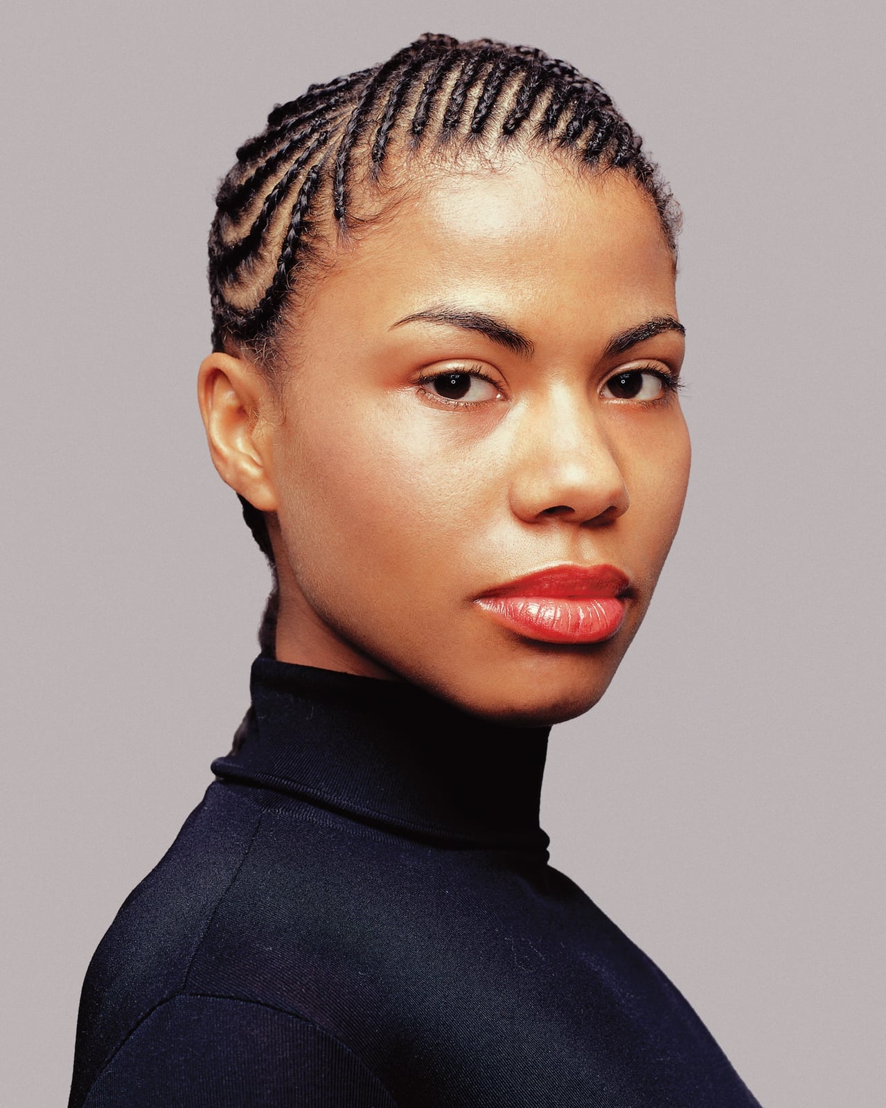 Short Coily Cornrows With Defined Parting Short Coily Cornrows With Defined Parting — Trendy Cornrows Hairstyles for Black Women