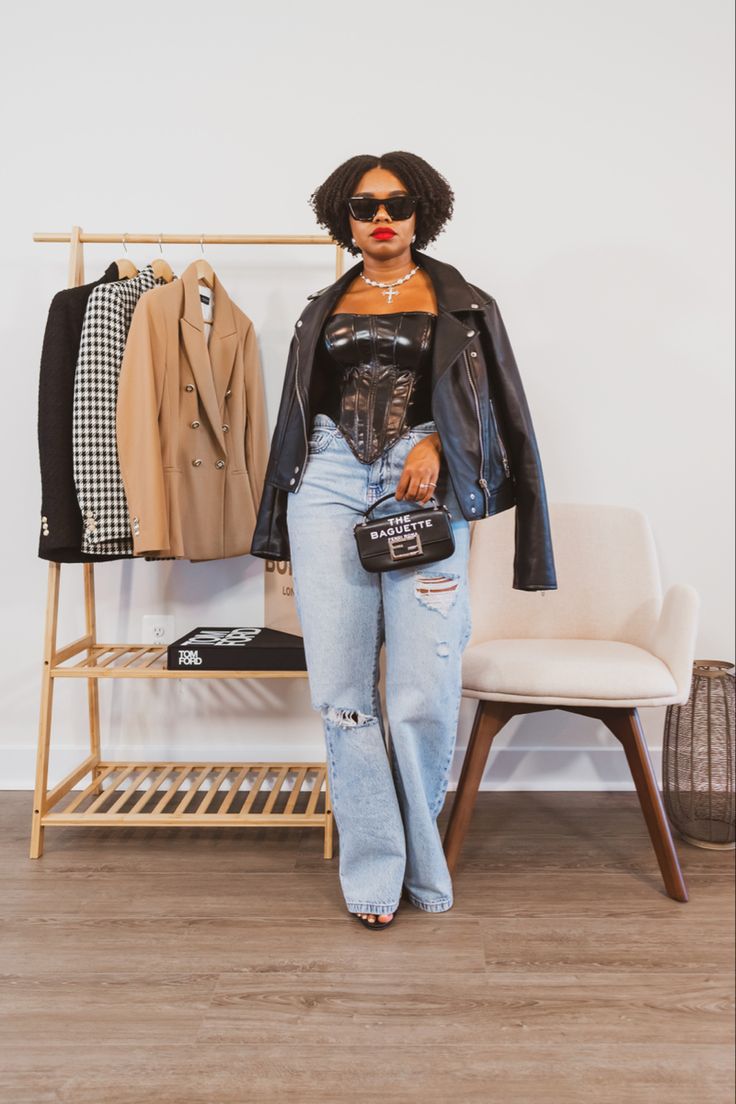 Black Leather Corset Top with Distressed Jeans — Trendy Corset Top Outfits
