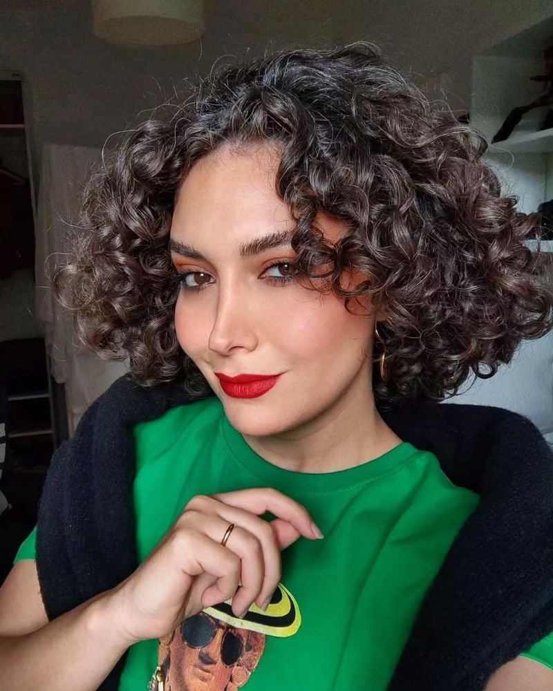 Chin Length Bob With Grey Streaks — Trendy Curly Hair