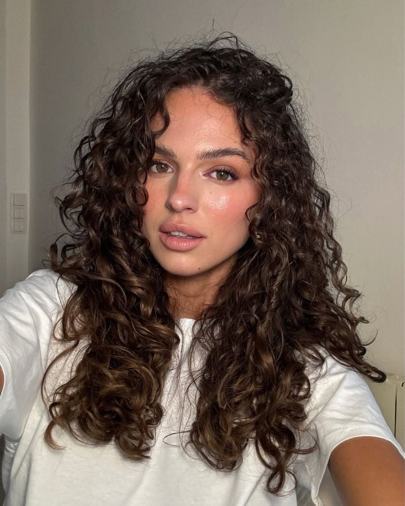 Collarbone Waves With Face-Framing Layers — Trendy Curly Hair