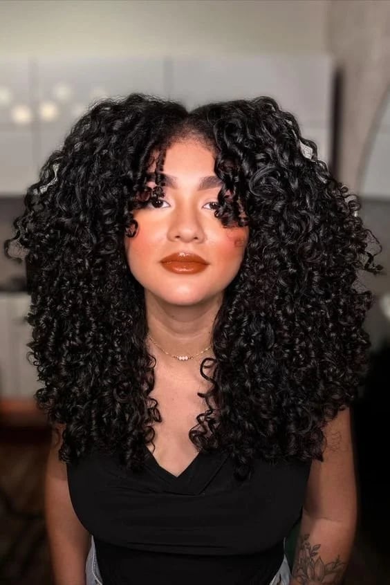 Collarbone Layers Thick Curls Collarbone Layers Thick Curls — Trendy Curly Hair Products