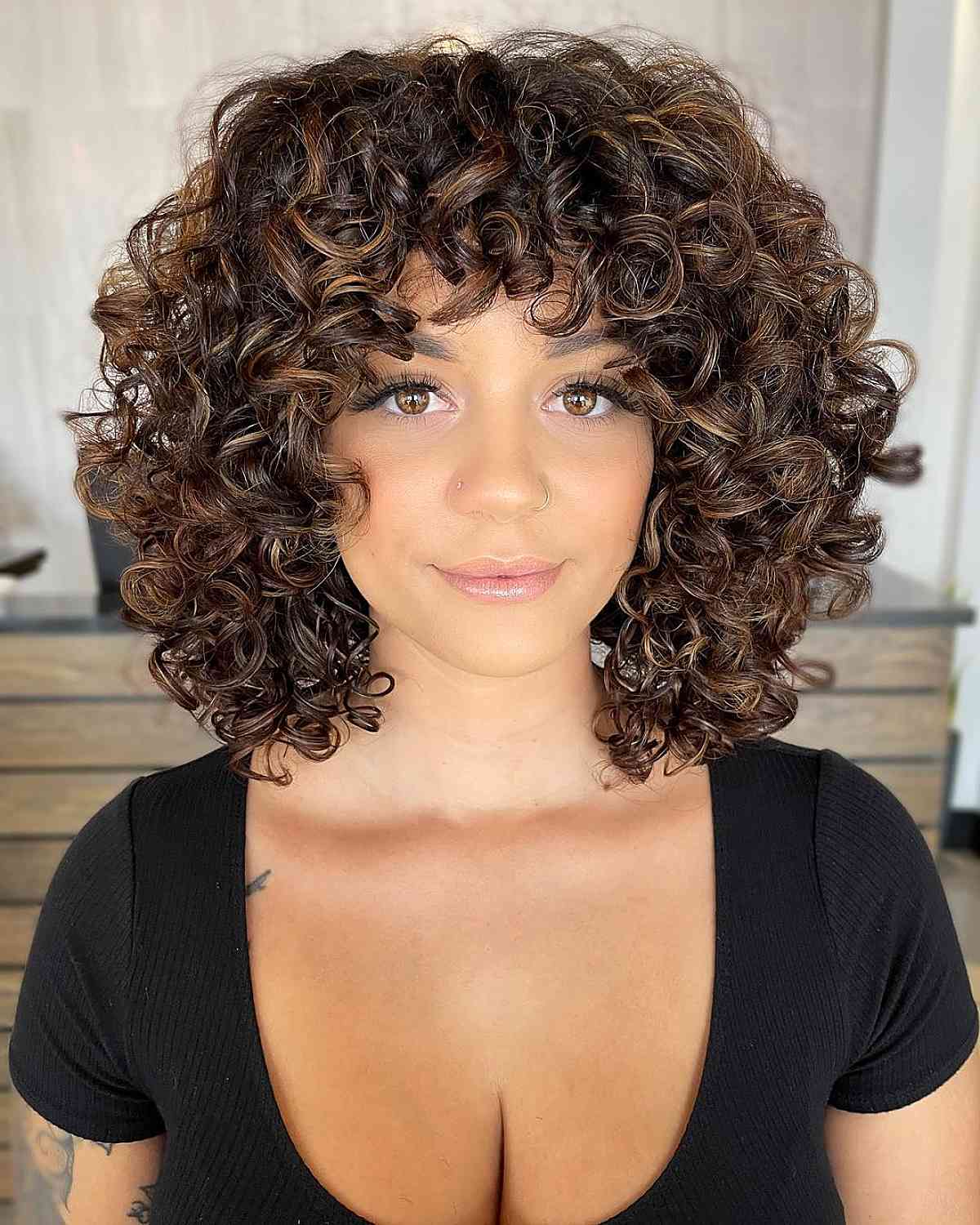 Short Layered Pixie With Curly Bangs — Trendy Curly Hair Routine