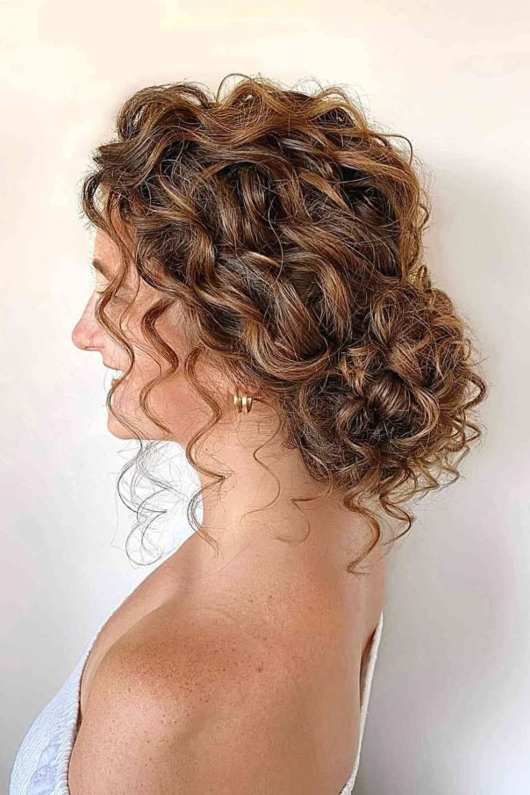 Romantic Curly Updo With Loose Tendrils Romantic Curly Updo With Loose Tendrils — Trendy Curly Hair Wedding