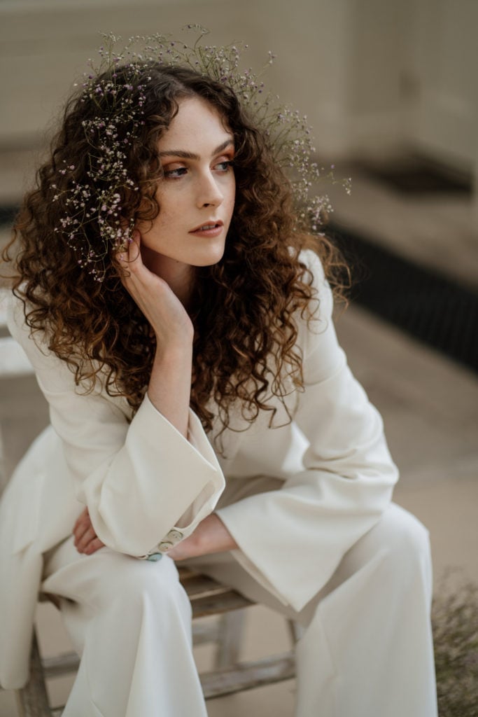 Long Dark Brown Loose Curls With Floral Accessory Long Dark Brown Loose Curls With Floral Accessory — Trendy Curly Hair Wedding