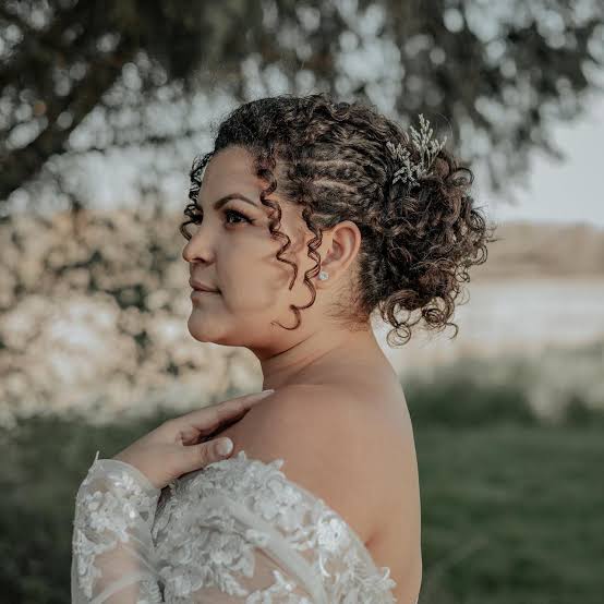 Dark Brown Curly Updo With Braids And Loose Curls Dark Brown Curly Updo With Braids And Loose Curls — Trendy Curly Hair Wedding