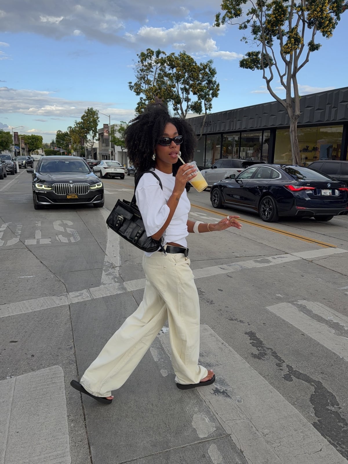 White T-Shirt and Cream Wide-Leg Trousers White T-Shirt and Cream Wide-Leg Trousers — Trendy Date Outfit