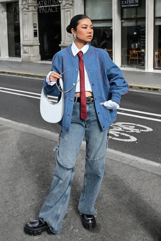 Denim Jacket With Contrast Stitching and Red Tie — Trendy Denim Jacket Outfits