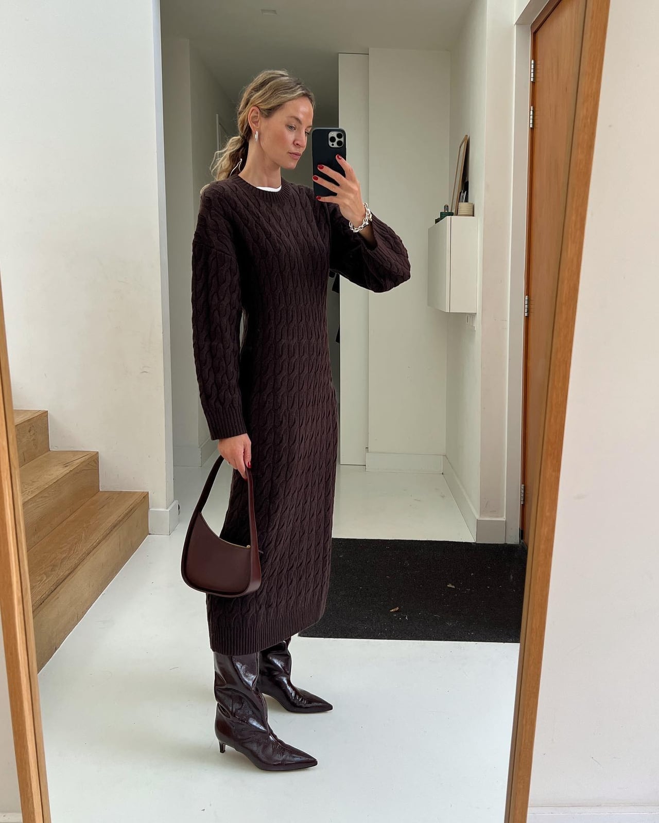 Black Slip Dress Over White Shirt With Lace Trim And Boots — Trendy Dress with Boots