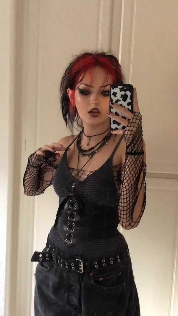 Corset Layered Over Fishnets with Loose Jeans Corset Layered Over Fishnets with Loose Jeans — Trendy Emo Style