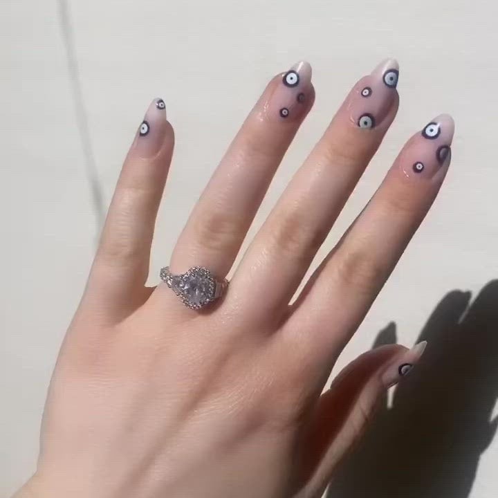 Scattered Evil Eye Short Almond Nails Scattered Evil Eye Short Almond Nails — Trendy Evil Eye Nails