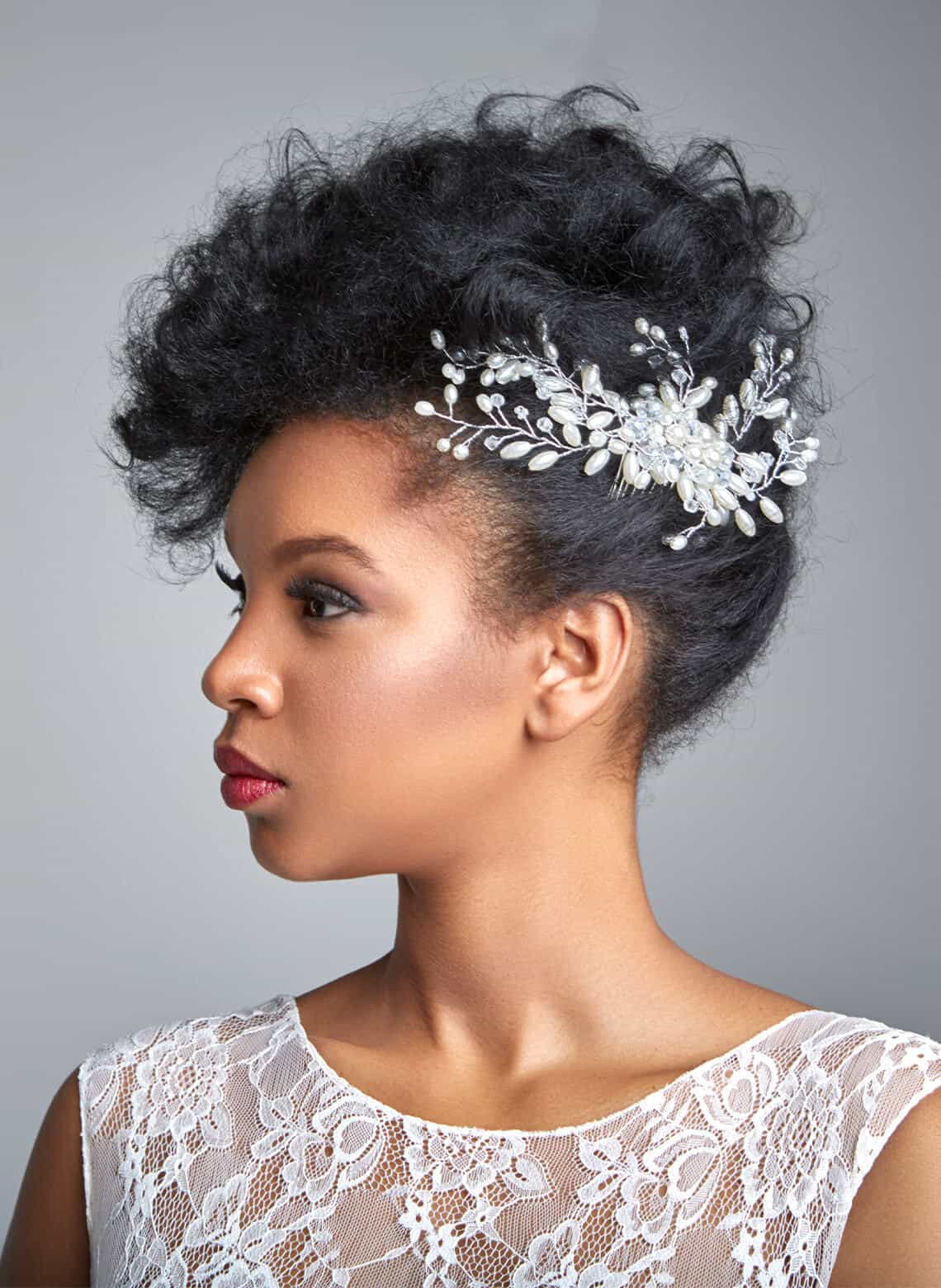 Black Curly Updo With Ornate Accessory — Trendy Formal Hair