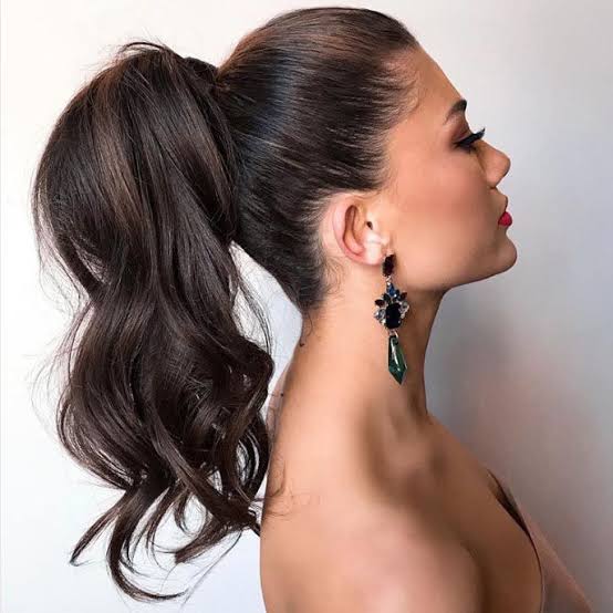 Voluminous Dark Brown Ponytail With Waves — Trendy Formal Hair