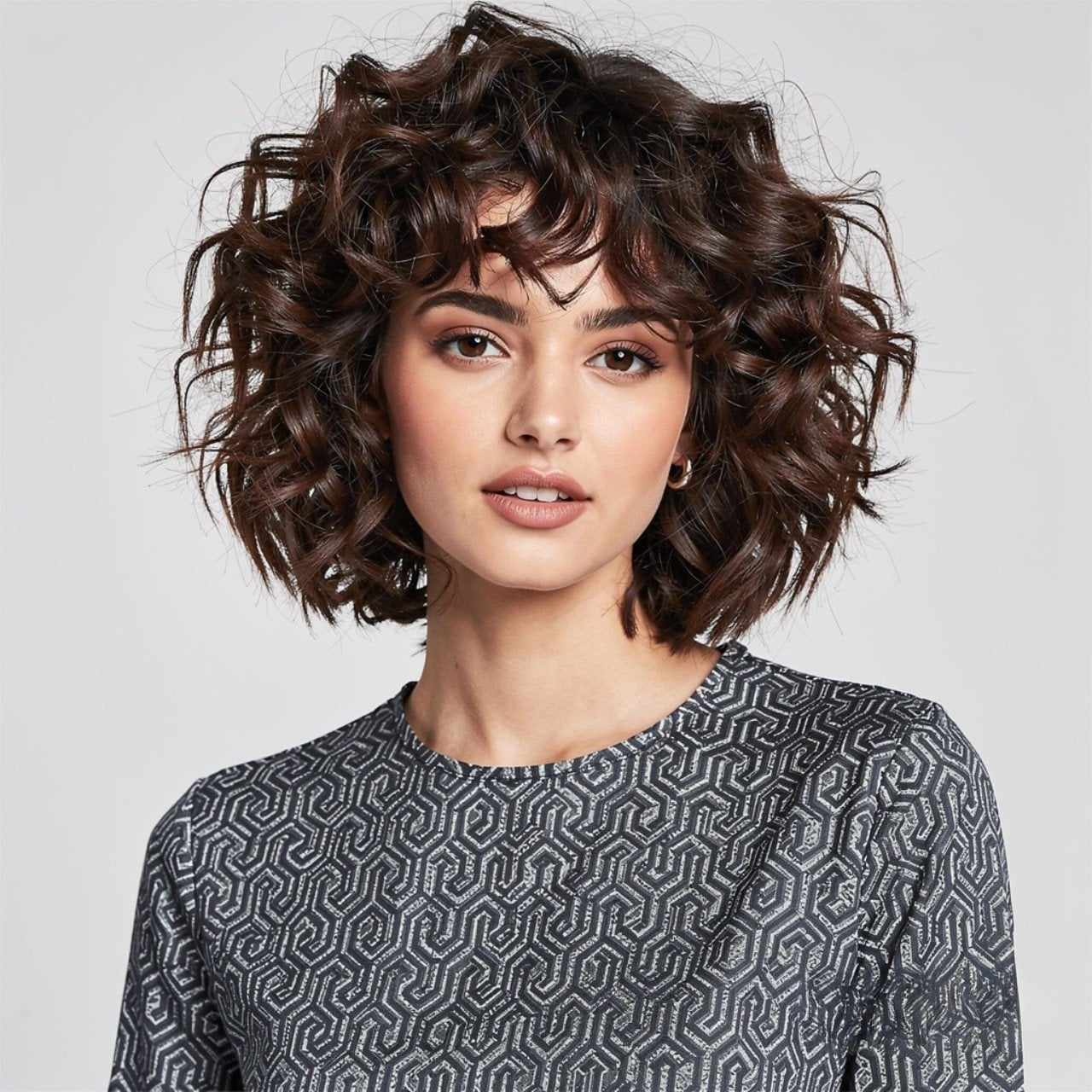 Chin Length Layered Bob With Wispy Bangs — Trendy Frizzy Hair