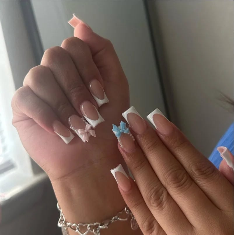 Square French Tips with Pearl and Bow Accents Square French Tips with Pearl and Bow Accents — Trendy Gender Reveal Nails