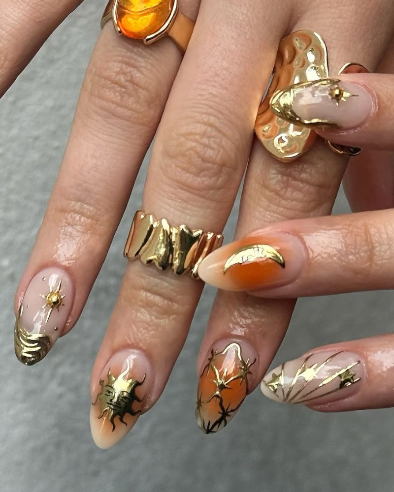 Medium Almond Nude Orange Gradient With Gold Decals — Trendy Gold Nails