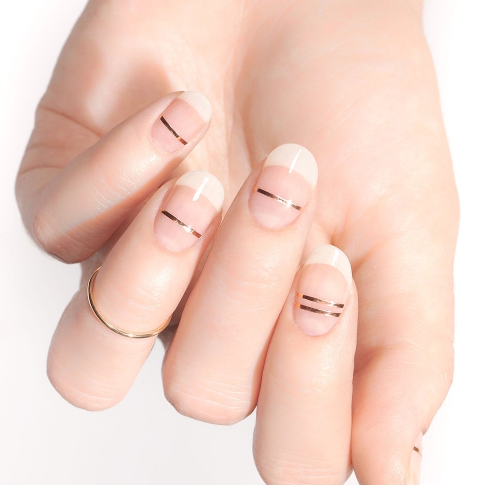Short Oval Nails With Thin Horizontal Gold Stripes — Trendy Gold Nails